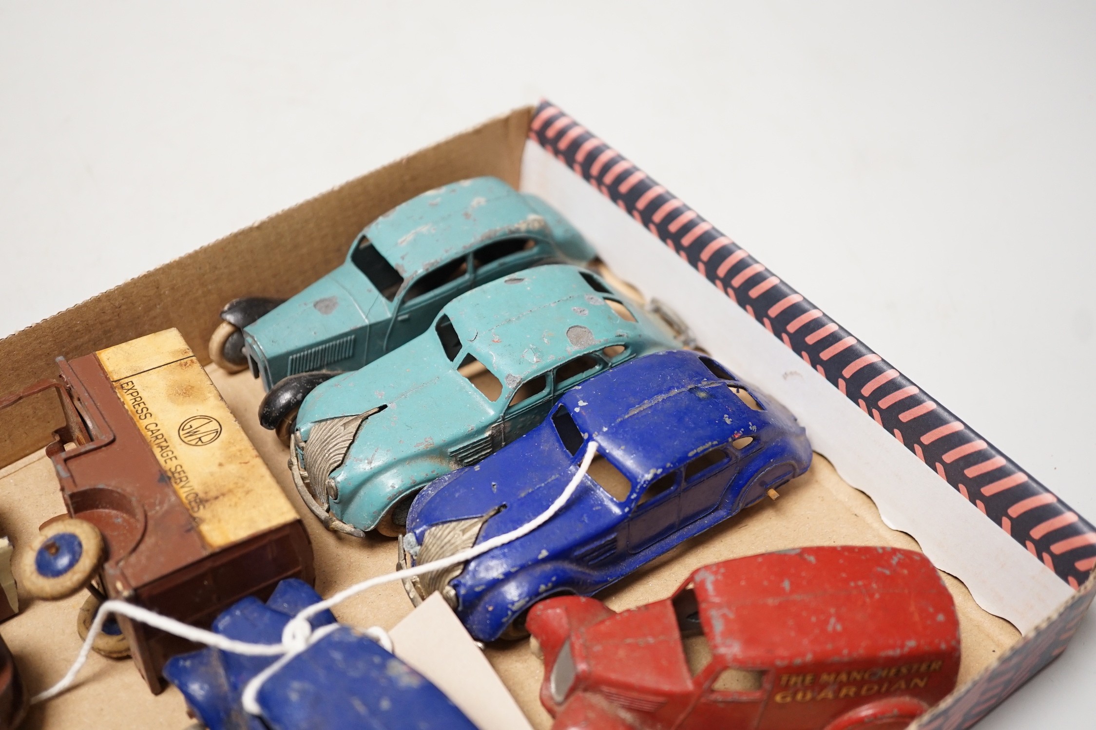 Rare pre-war Dinky toys including two 28-series, second-type delivery vans, Pickfords and Manchester Guardian